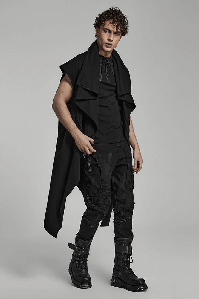 Model wearing a Black Asymmetrical Knit Vest with Gothic Hem, paired with stylish black cargo pants and combat boots.