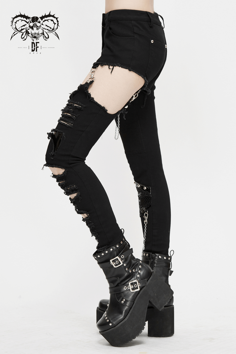 Gothic black asymmetrical skinny trousers with ripped effect and chains, perfect for edgy fashion enthusiasts.
