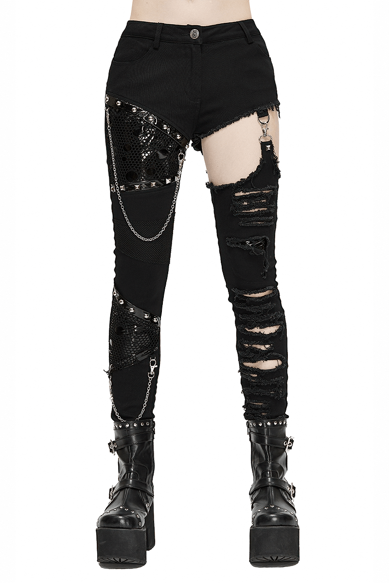 Trendy black asymmetrical pants with chains and ripped details for women, perfect for a gothic fashion look.