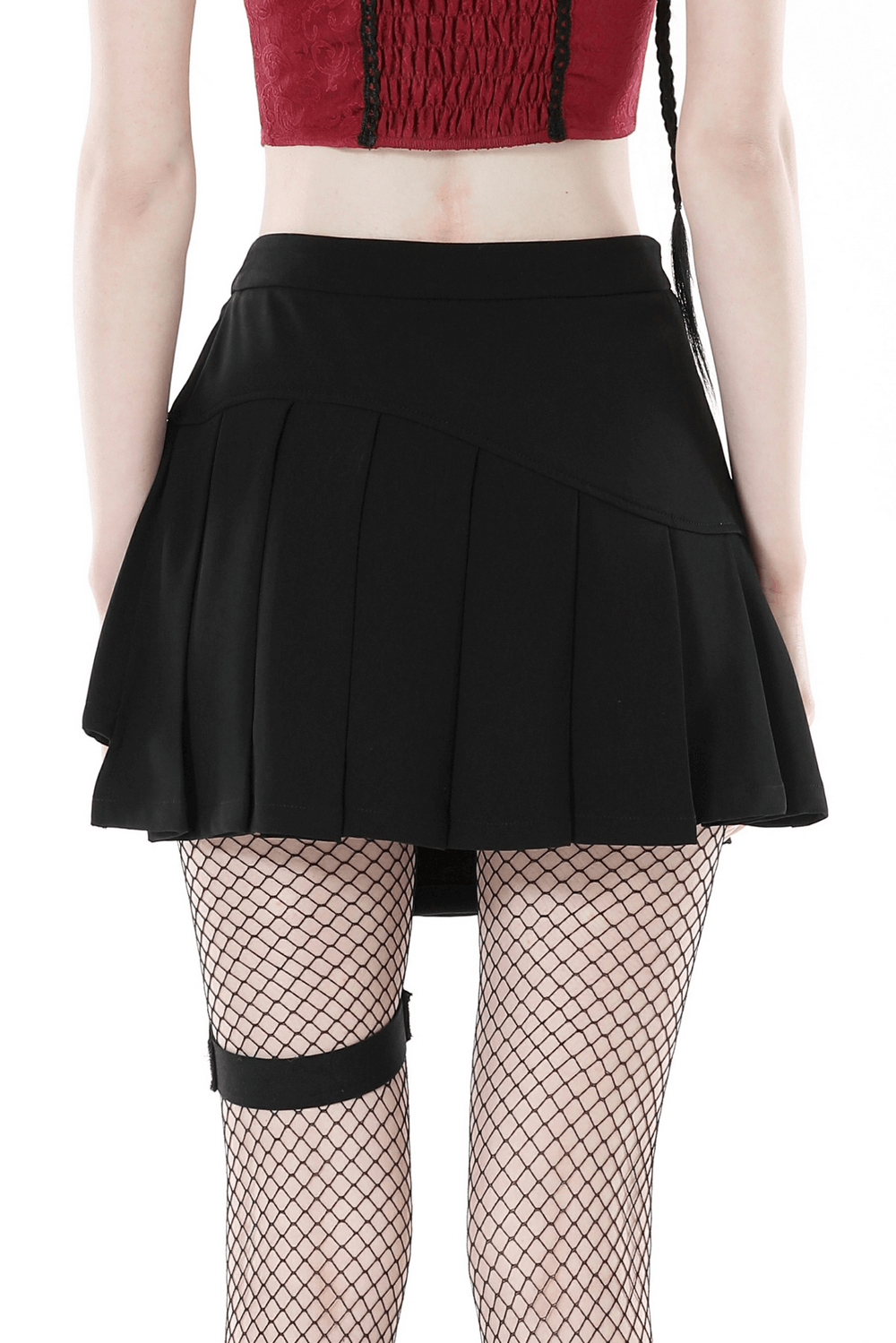 Black asymmetrical pleated punk skirt with safety pins, highlighting a high-waisted design and edgy style.
