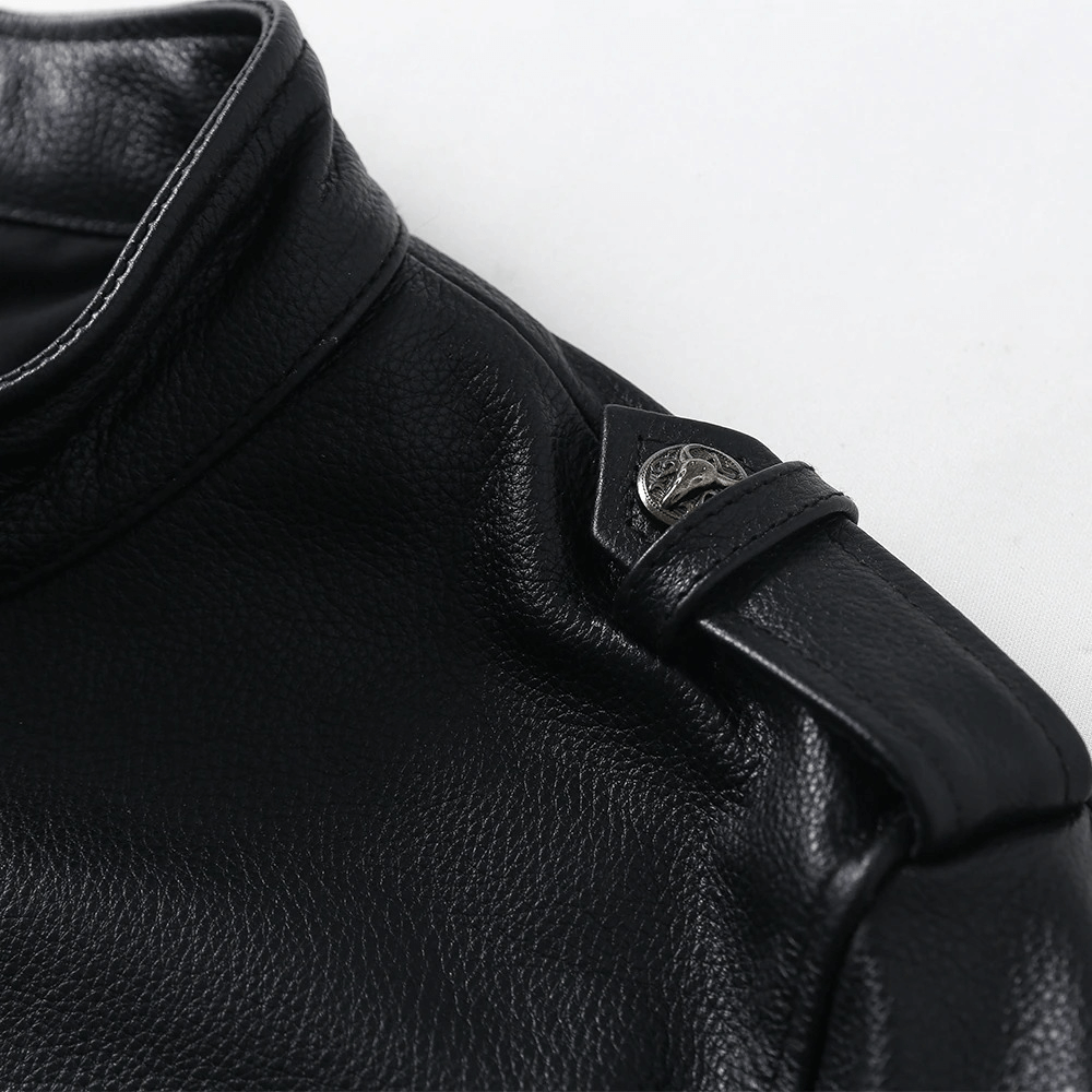 Close-up of a black biker leather jacket collar featuring stylish detail and shoulder button accent.
