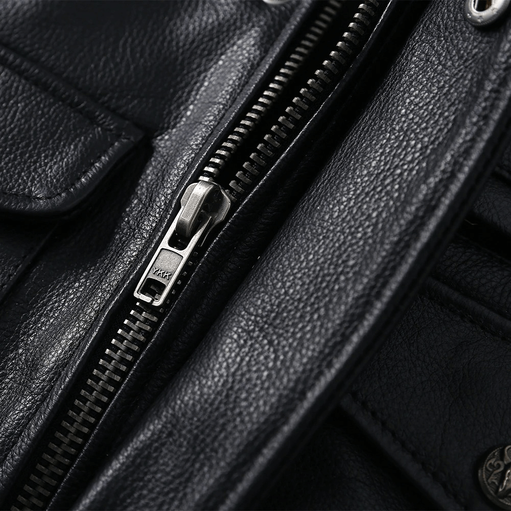 Close-up of a black leather biker jacket zipper detail, showcasing premium quality and craftsmanship.