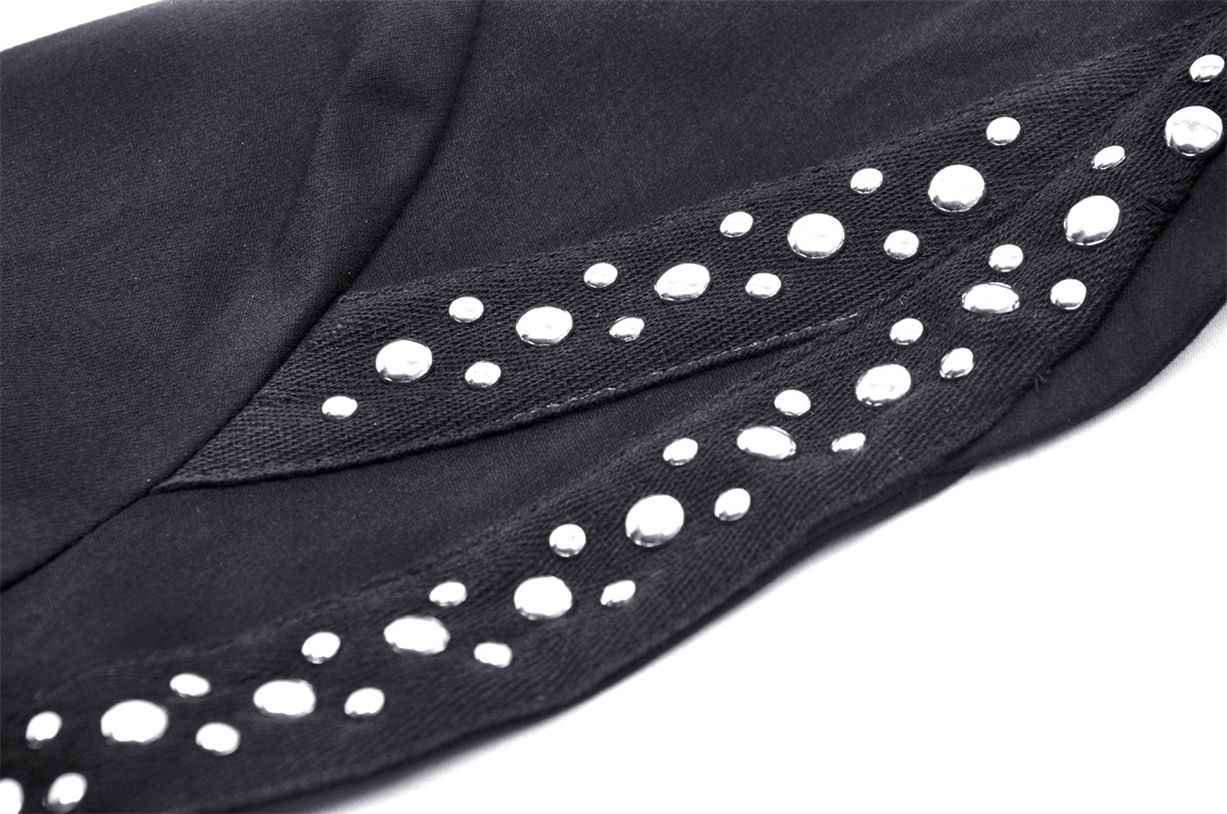 Close-up of elegant black bolero with sparkly bead embellishments, perfect for evening wear.
