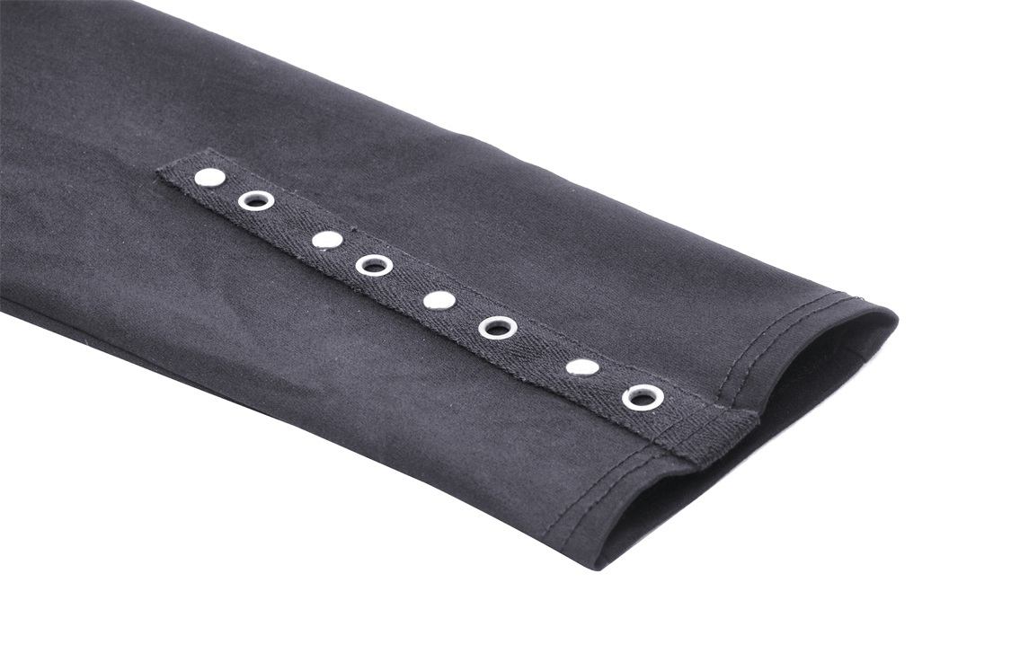 Close-up of the sleeve of a black bolero featuring silver bead embellishments for added elegance.