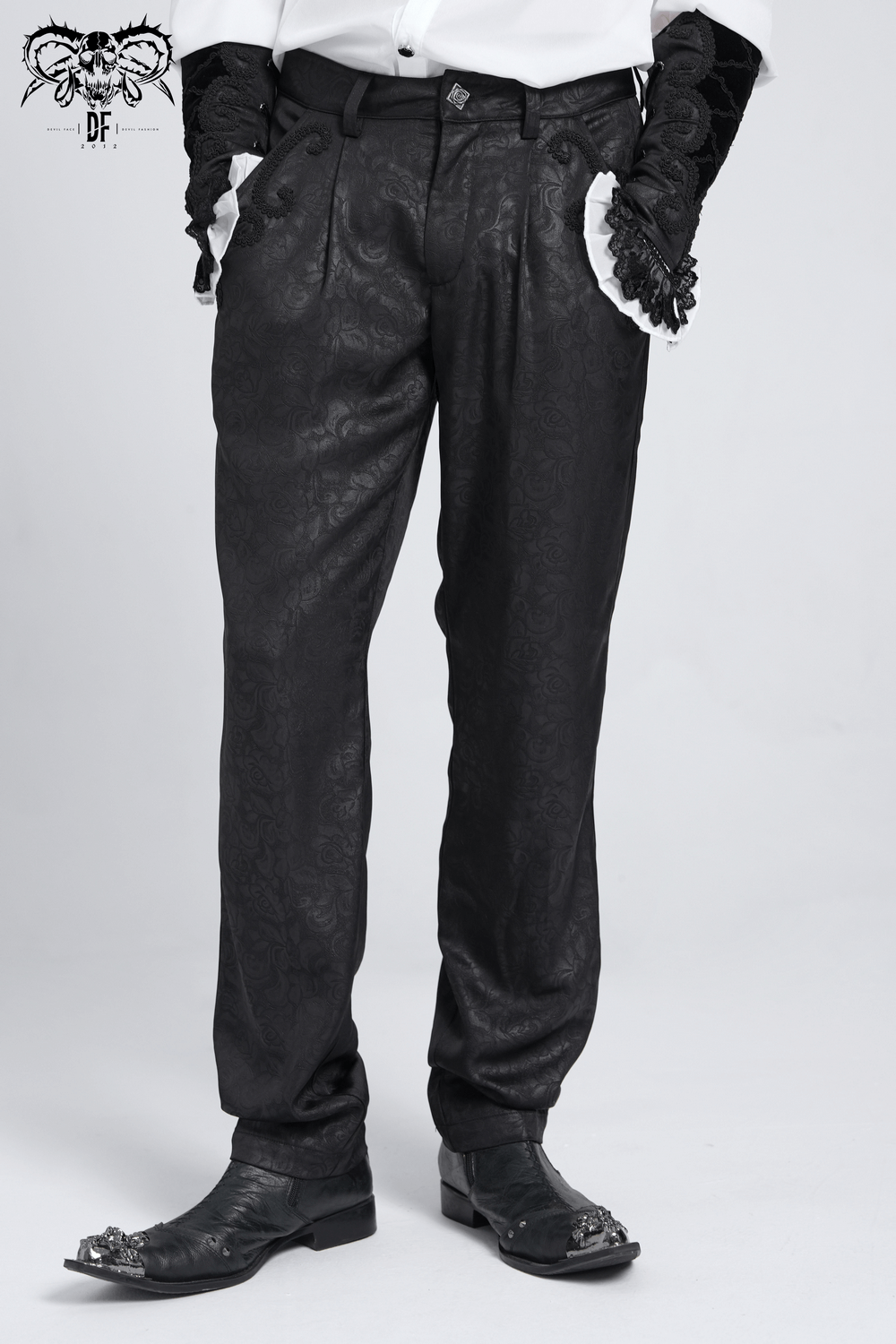 Black brocade gothic pants featuring intricate embroidered details and stylish fit, perfect for unique fashion statements.