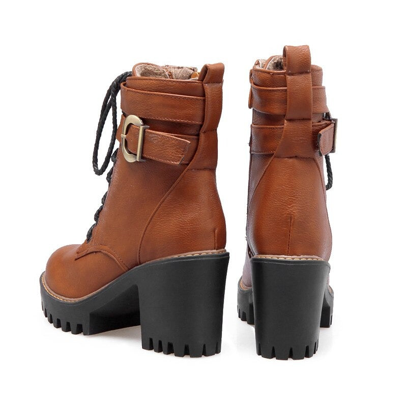 Stylish brown lace-up ankle boots with buckle and high heel, perfect for autumn and winter fashion.