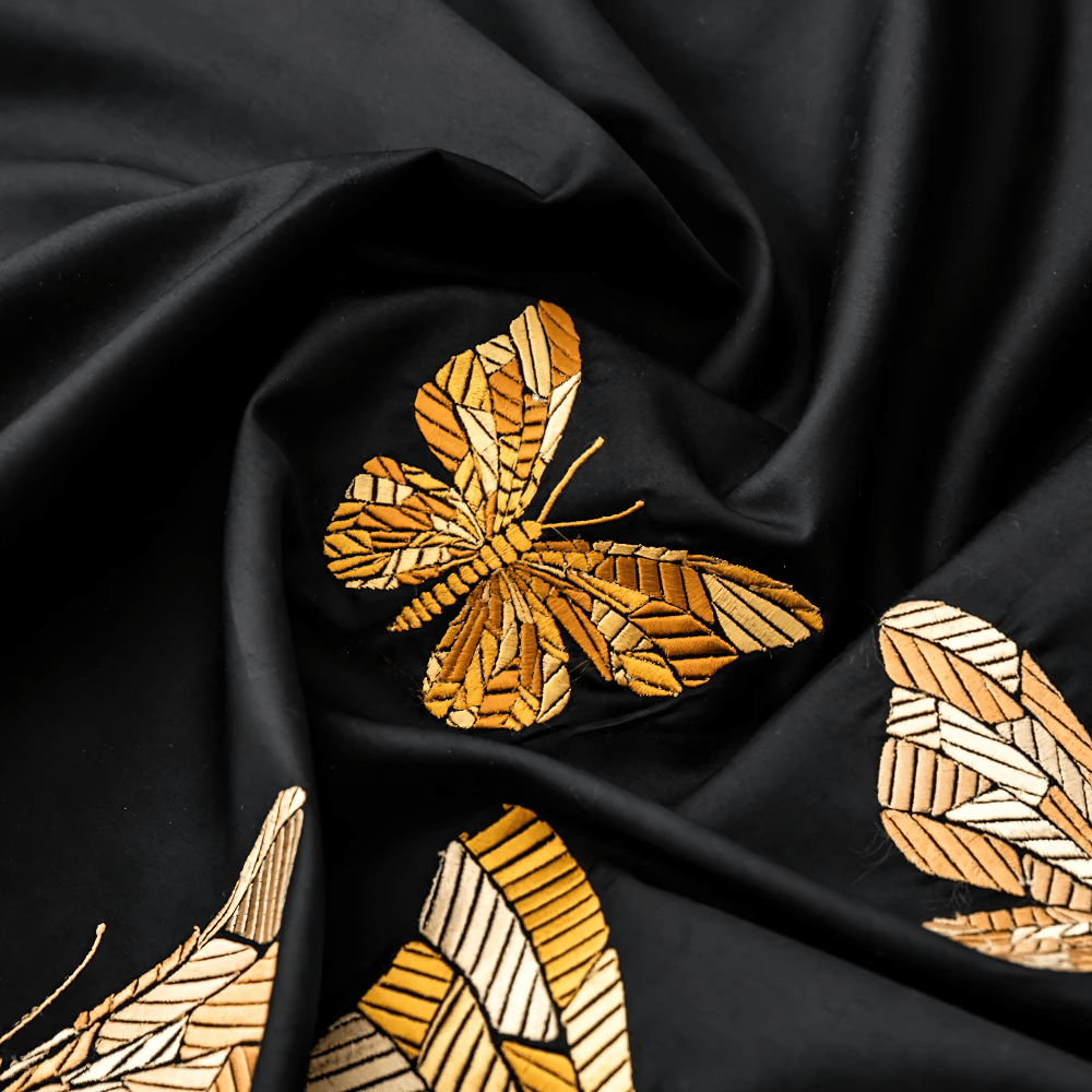 Black Butterfly Embroidered Egyptian Cotton Bedding Set featuring elegant golden butterfly embroidery on black fabric.