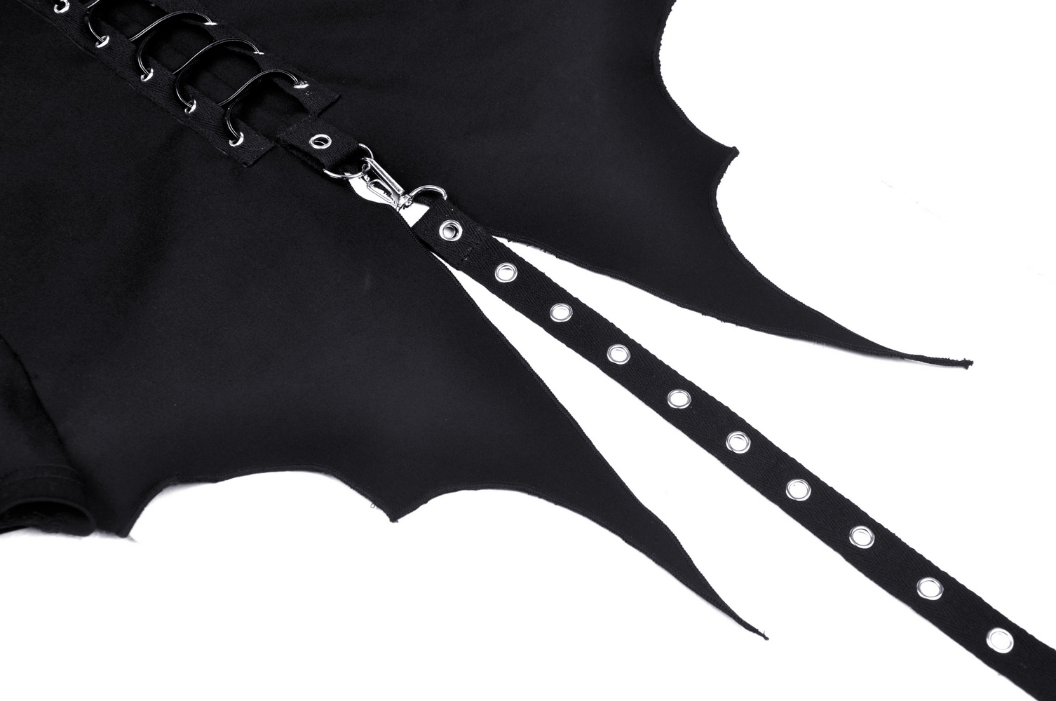 Close-up of gothic black cat crop top with bat wing design and edgy lace-up details.