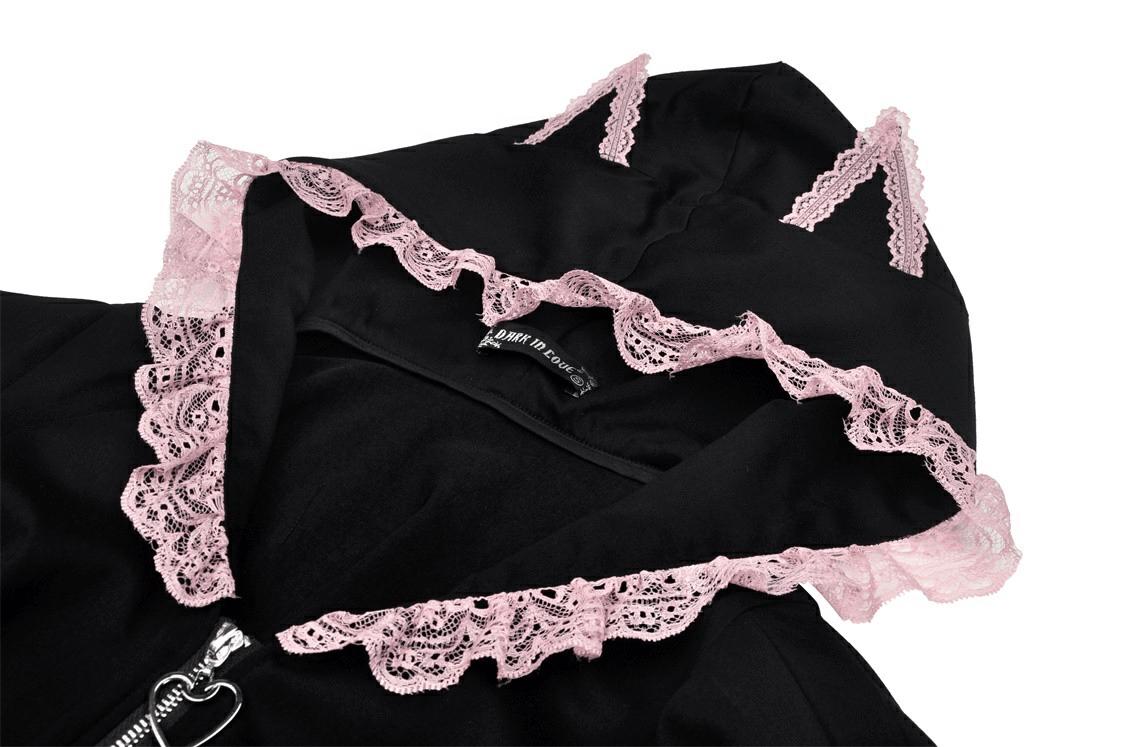 Close-up of black crop top hoodie featuring pink lace collar and playful cat ears for a cute, feline-inspired style.