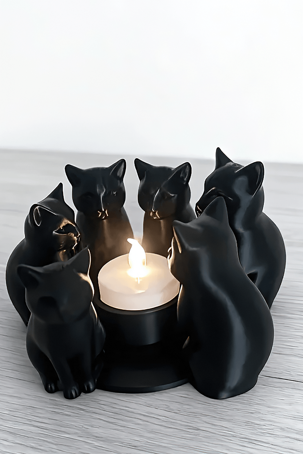 Black Cats Candle Holder for Witchy Accent Decor featuring sleek black kittens around a tea light.
