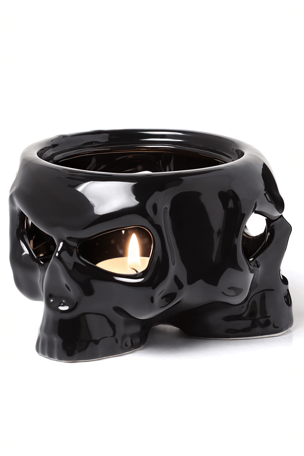Black ceramic skull mug warmer for candles and drinks, adding gothic flair to your decor while keeping beverages warm.