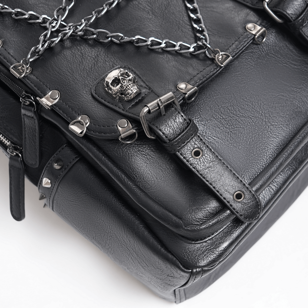 Black gothic backpack featuring skull embellishment and chain detailing with edgy spikes. Perfect for alternative fashion!