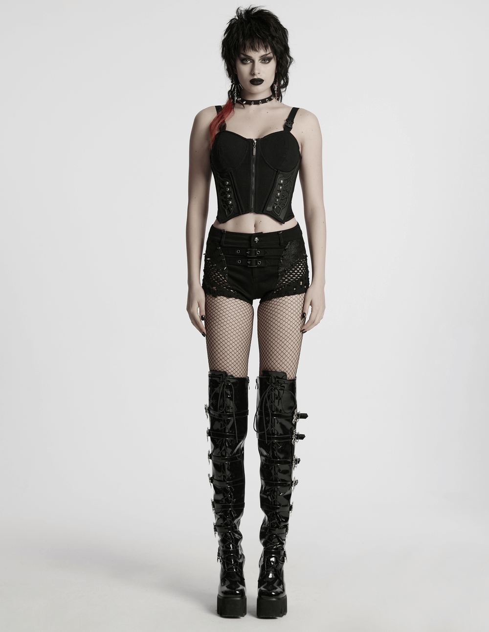 Stylish black cyberpunk corset waistcoat with buckle straps, paired with faux leather shorts and thigh-high boots.