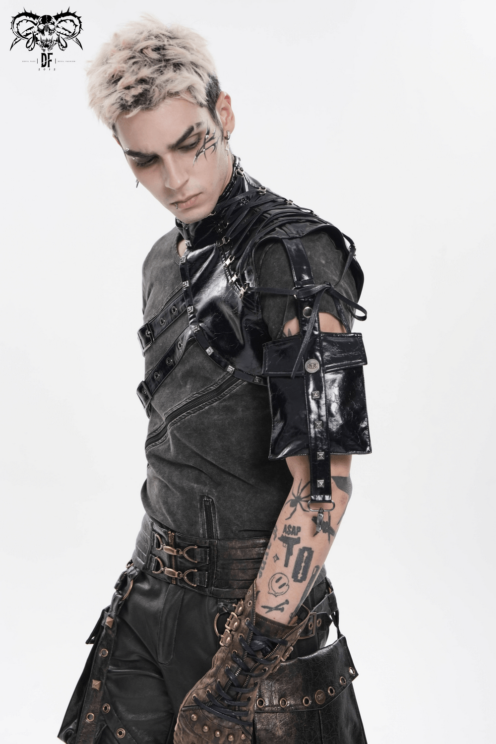 Model showcasing Black Cyberpunk Faux Leather Buckle Shoulder Harness Vest with gothic style and intricate details.