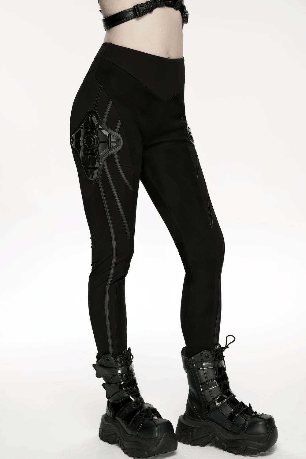 Alt Tag: Black Cyberpunk Panel Leggings with 3D Side Armor on model, black futuristic leggings with sculpted panels and 3D rubber side armor