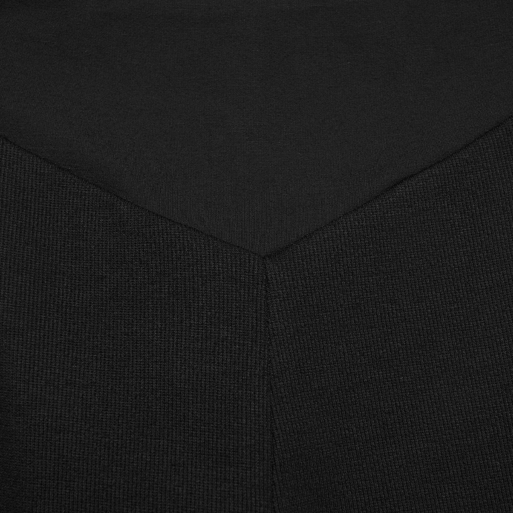 Alt Tag: Black Cyberpunk Panel Leggings with 3D Side Armor close-up of sculpted panel seam and textured elastic knit fabric in black