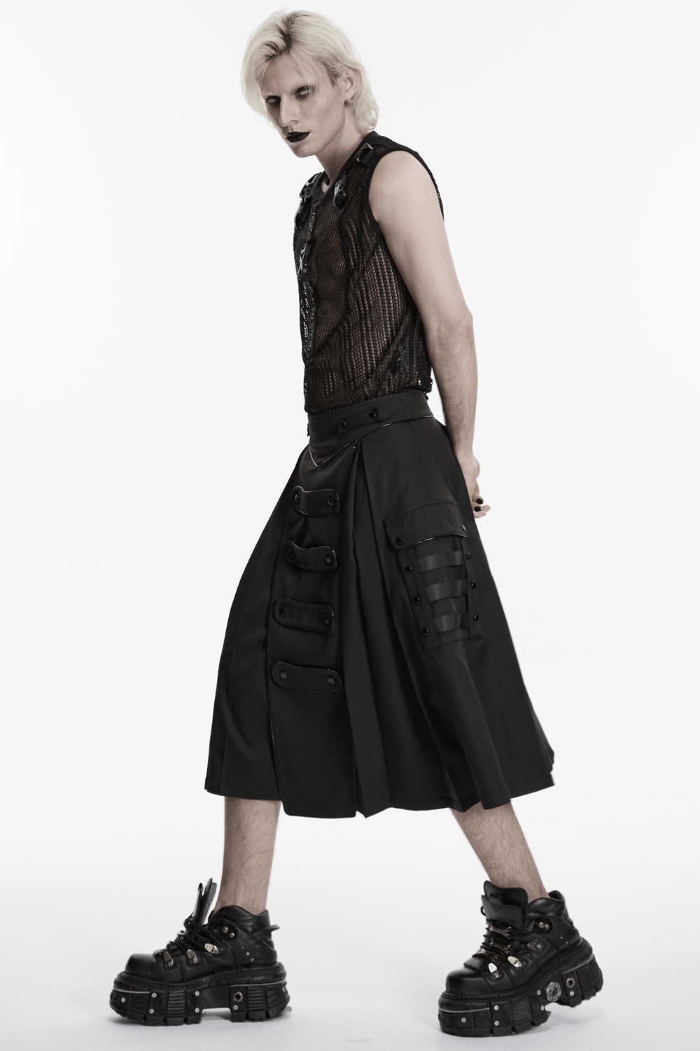 Black Cyberpunk Utility Skirt with Strap Panels for Men featuring draped twill and bold accents.