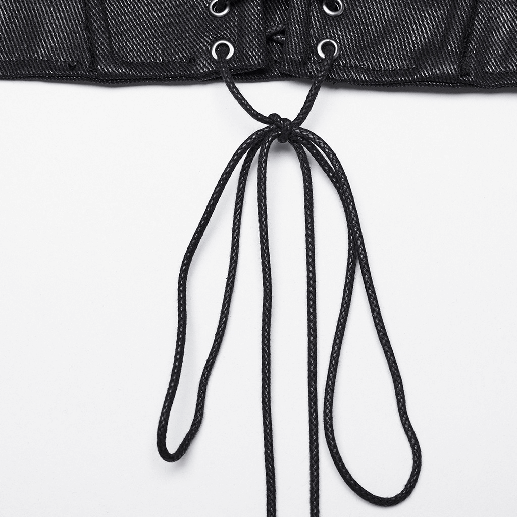 Close-up of black cyberpunk corset lace-up back with metal eyelets and decorative laces for adjustable fit.