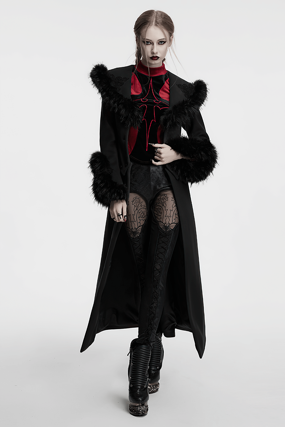 Black detachable coat with fur collar, gothic style, paired with red top and patterned leggings.