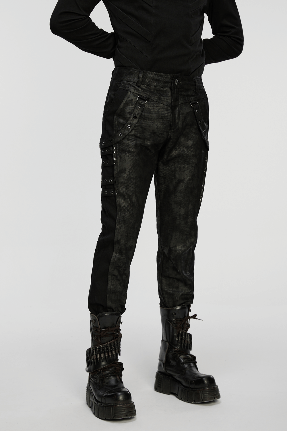Black Distressed Twill Pants with Metal Eyelet Straps worn with a fitted black shirt and heavy boots.