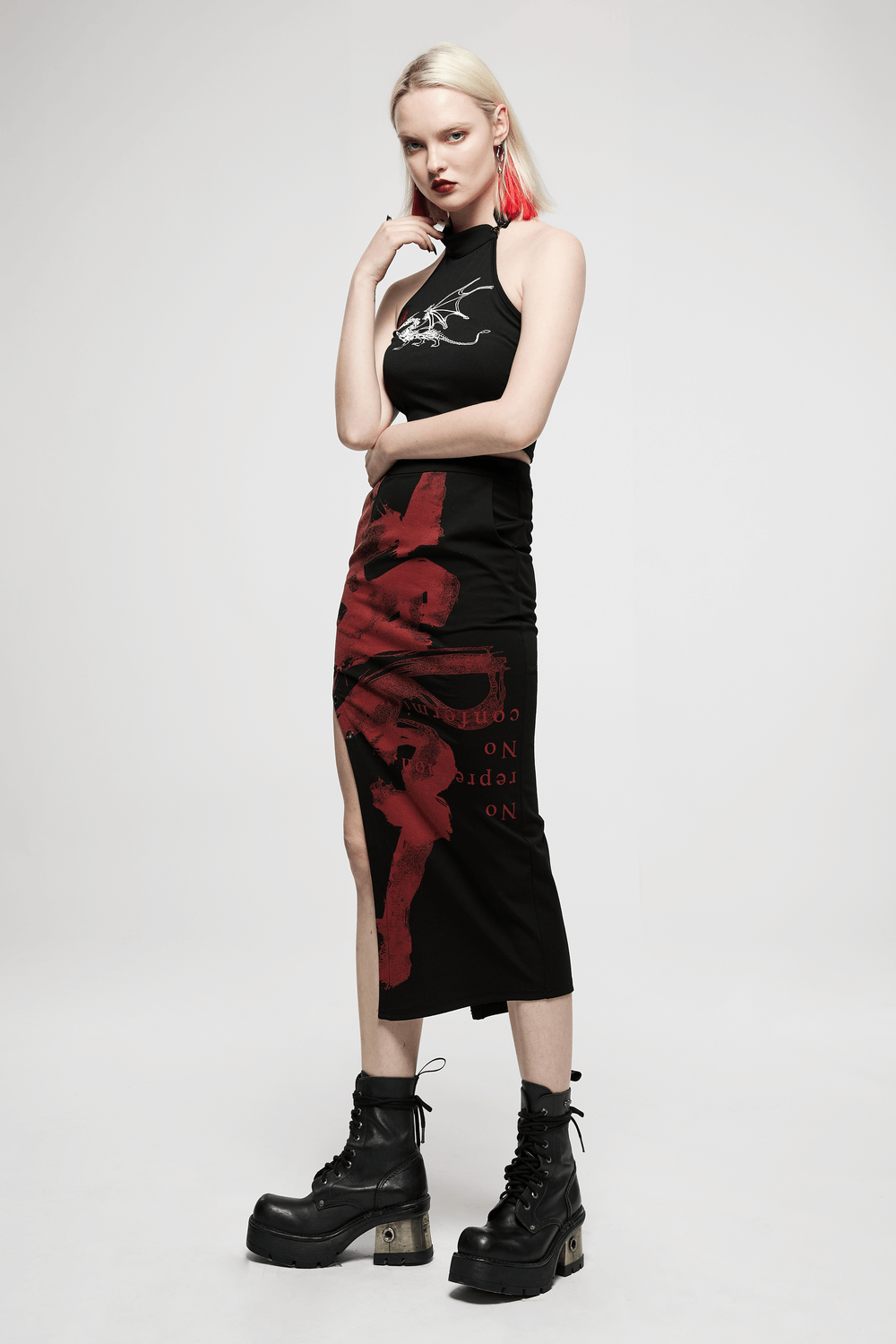 Black dragon print asymmetric skirt with chains, showcasing punk style and unique keel embroidery.
