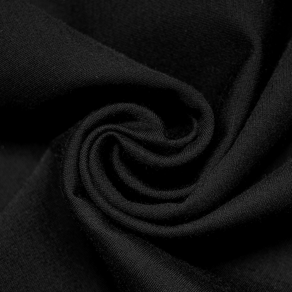 Close-up of soft black fabric, perfect for creating stylish punk fashion pieces like dragon print skirts.