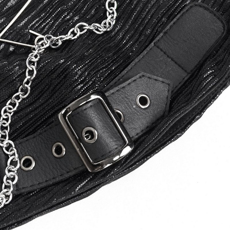 Close-up of black batwing buckle hat featuring edgy chain and strap details in gothic style.