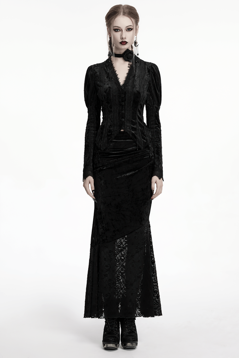 Model showcasing a black elegant lace asymmetrical skirt with fishtail design and textured velvet top.