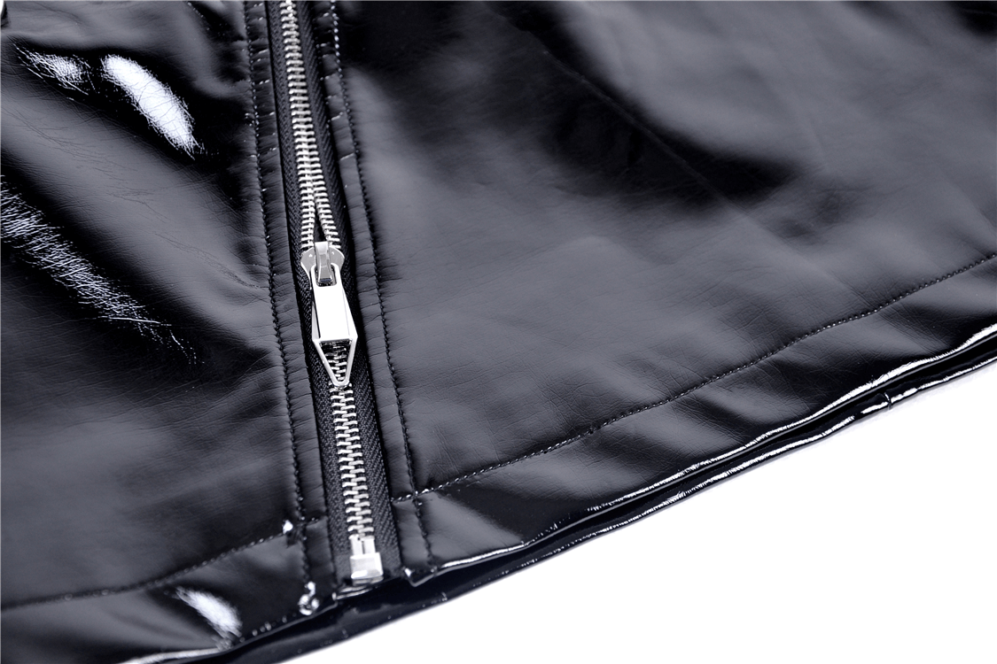 Close-up of a black faux leather mini skirt showcasing the sleek side zipper detail.