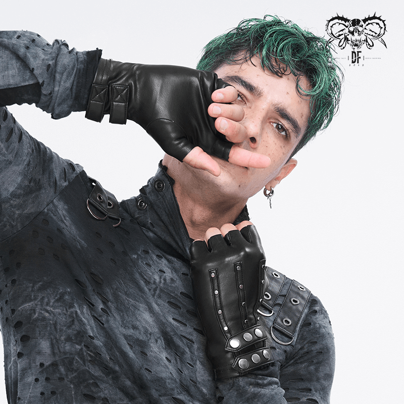 Model showcasing black faux leather motorcycle gloves with studs, exuding edgy style and confidence.