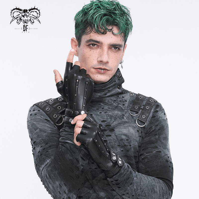 Model showcasing black faux leather motorcycle gloves with protective studs, styled in edgy fashion.