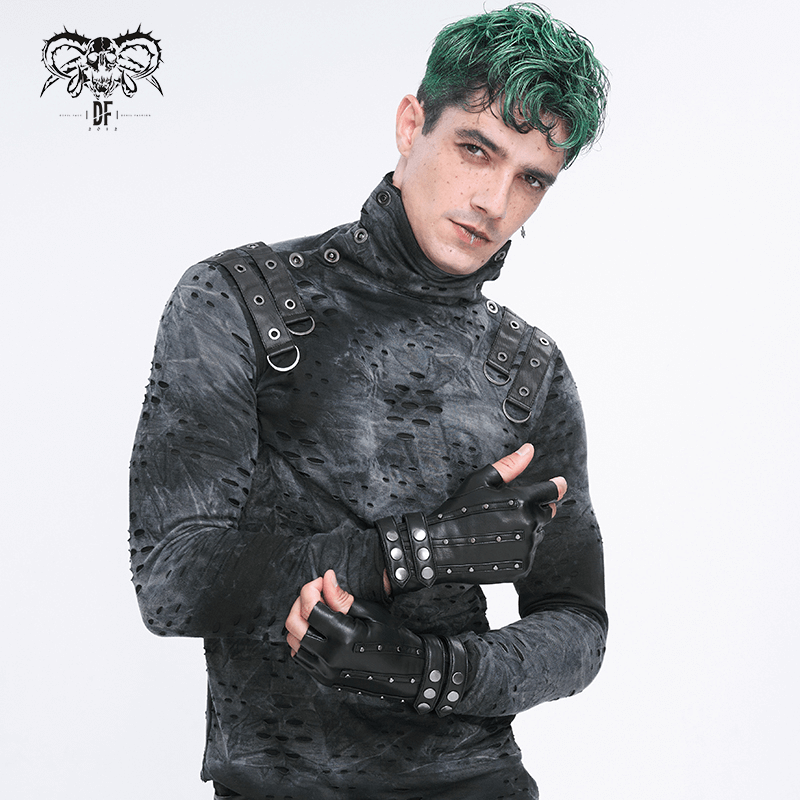 Model wearing edgy black motorcycle gloves and a stylish gray top with studs, showcasing a bold fashion statement.