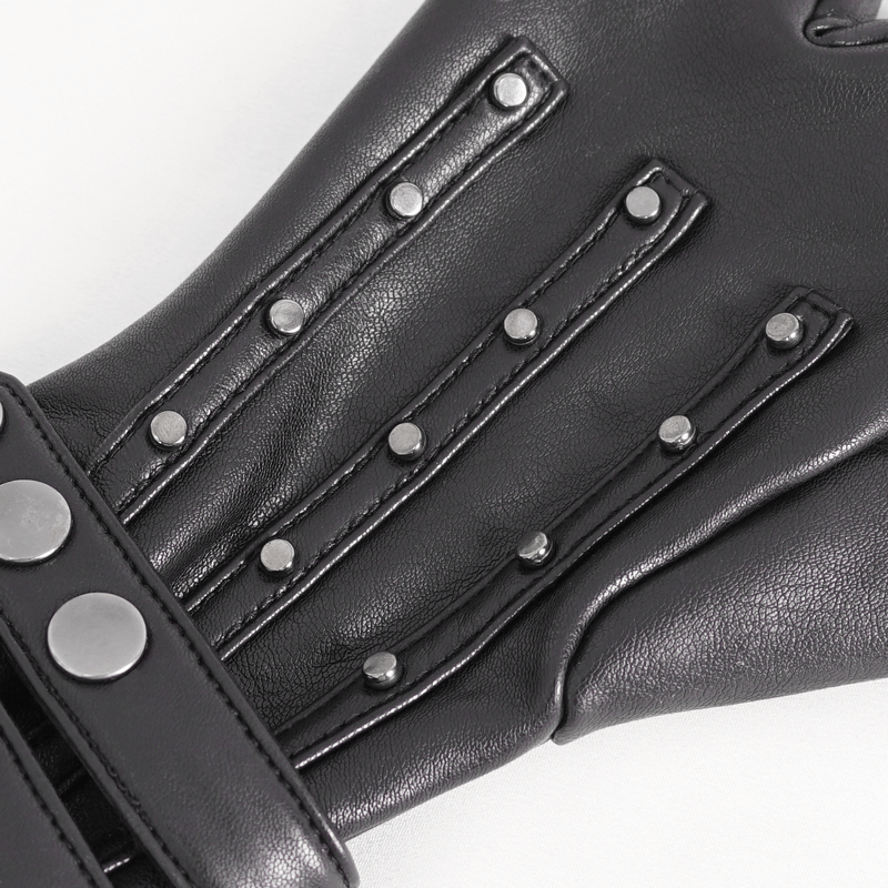 Close-up of black faux leather motorcycle gloves with protective studs for rugged style.