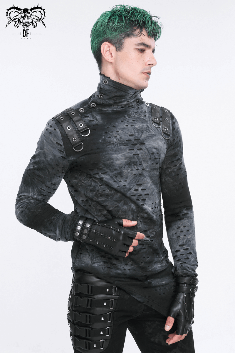 Model showcasing a stylish black top with studs and matching fingerless gloves, exuding edgy fashion.