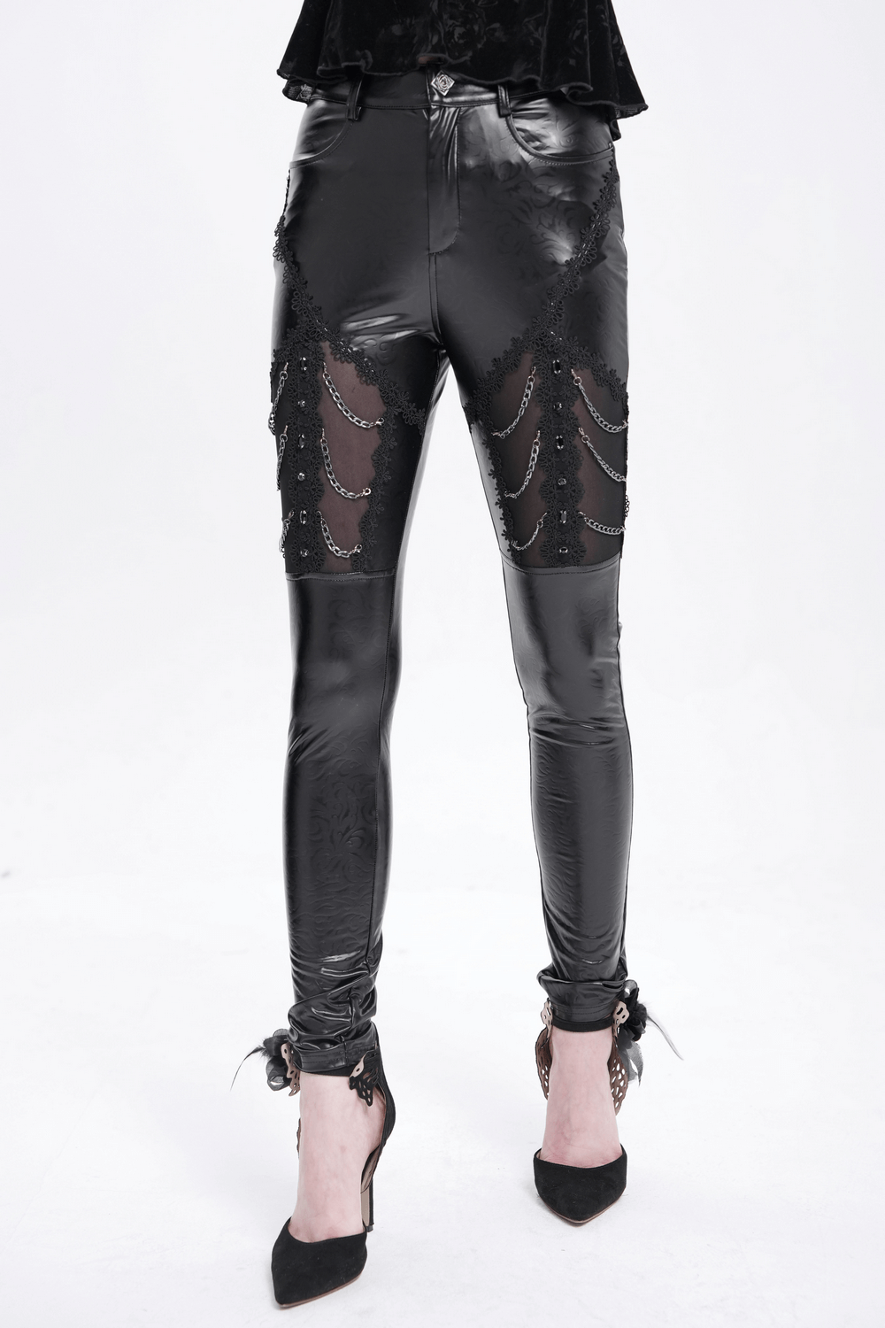 Black faux leather pants with chain and sequin details, perfect for gothic and punk fashion.
