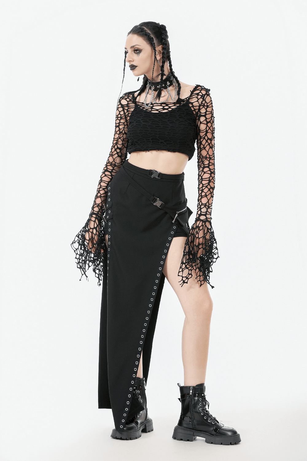 Black Fishnet Mesh Off-Shoulder Gothic Crop Top styled with edgy black skirt and combat boots.