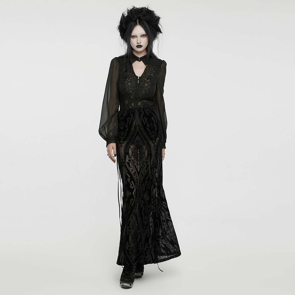 Elegant model in black flocked mesh gothic maxi skirt with lace details and sheer blouse.