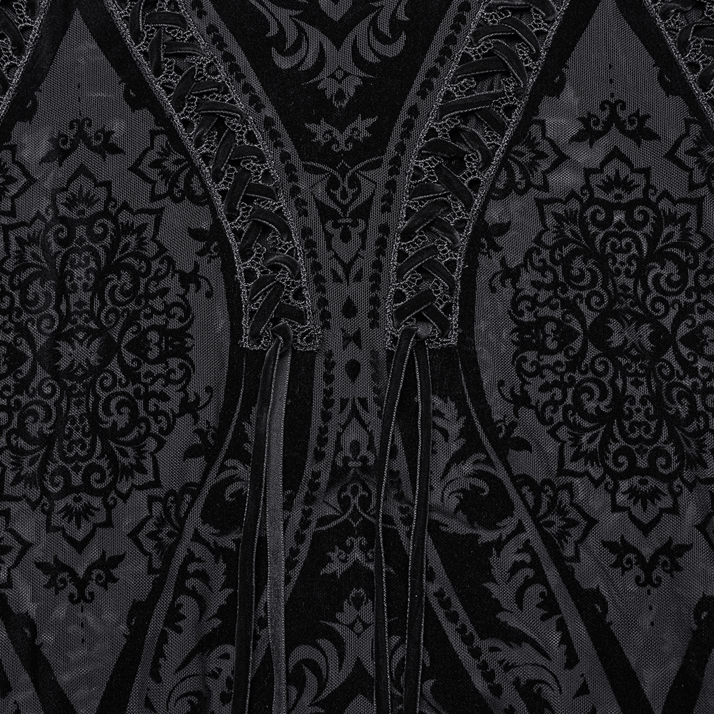 Close-up of black flocked mesh fabric with intricate gothic totem pattern and lace details.