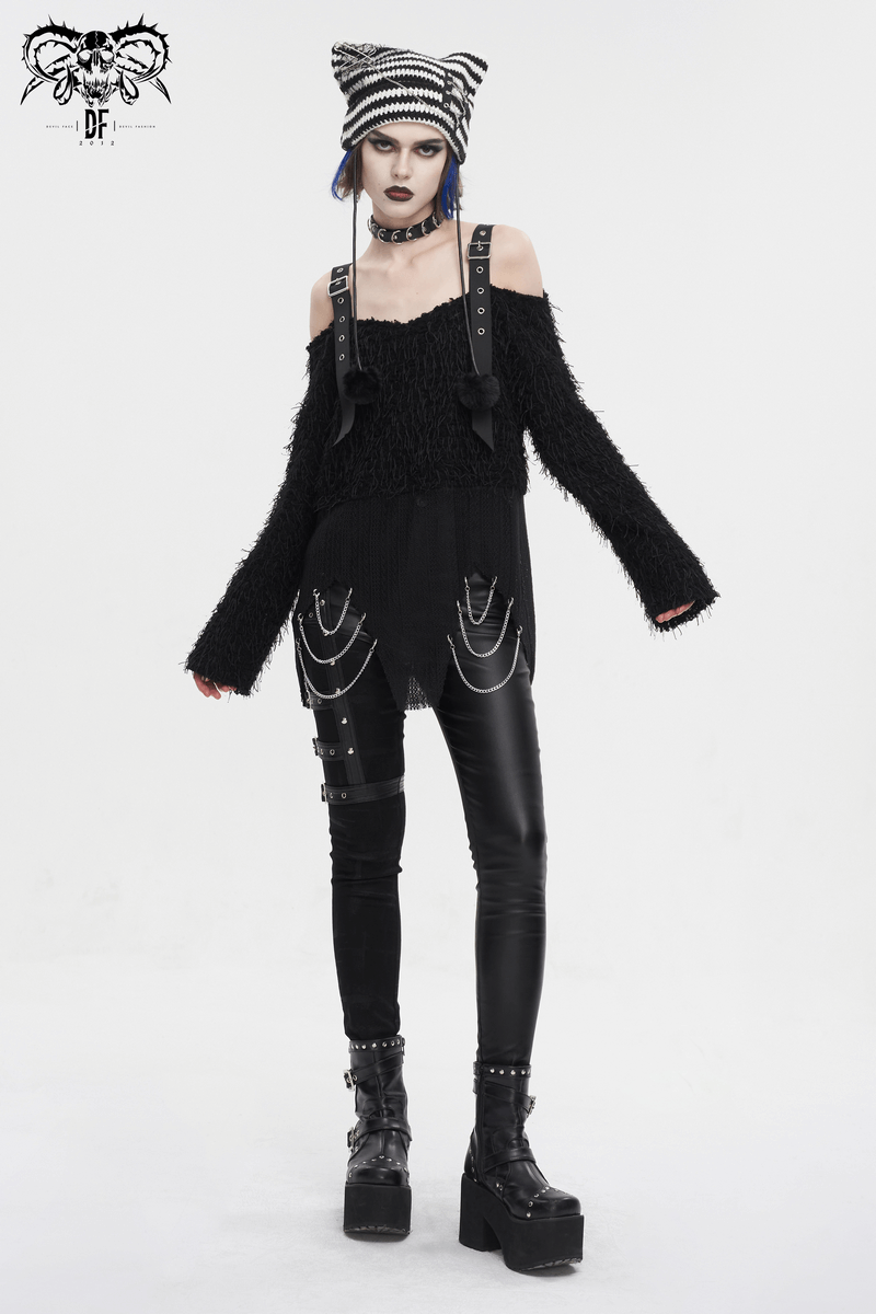 Edgy black fluffy off-shoulder sweater with asymmetrical design, paired with punk accessories and leather pants.