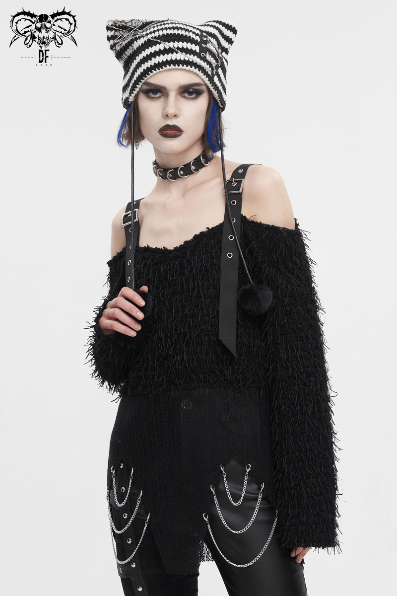 Model in black fluffy off-shoulder sweater, punk accessories, showcasing edgy fashion and individuality.