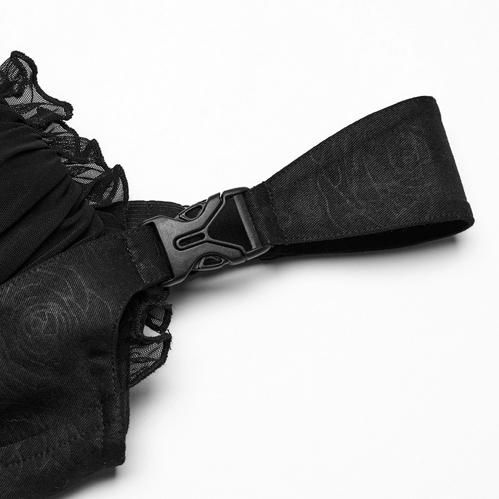 Close-up of the adjustable strap on a black goth corset cami with delicate lace detail.