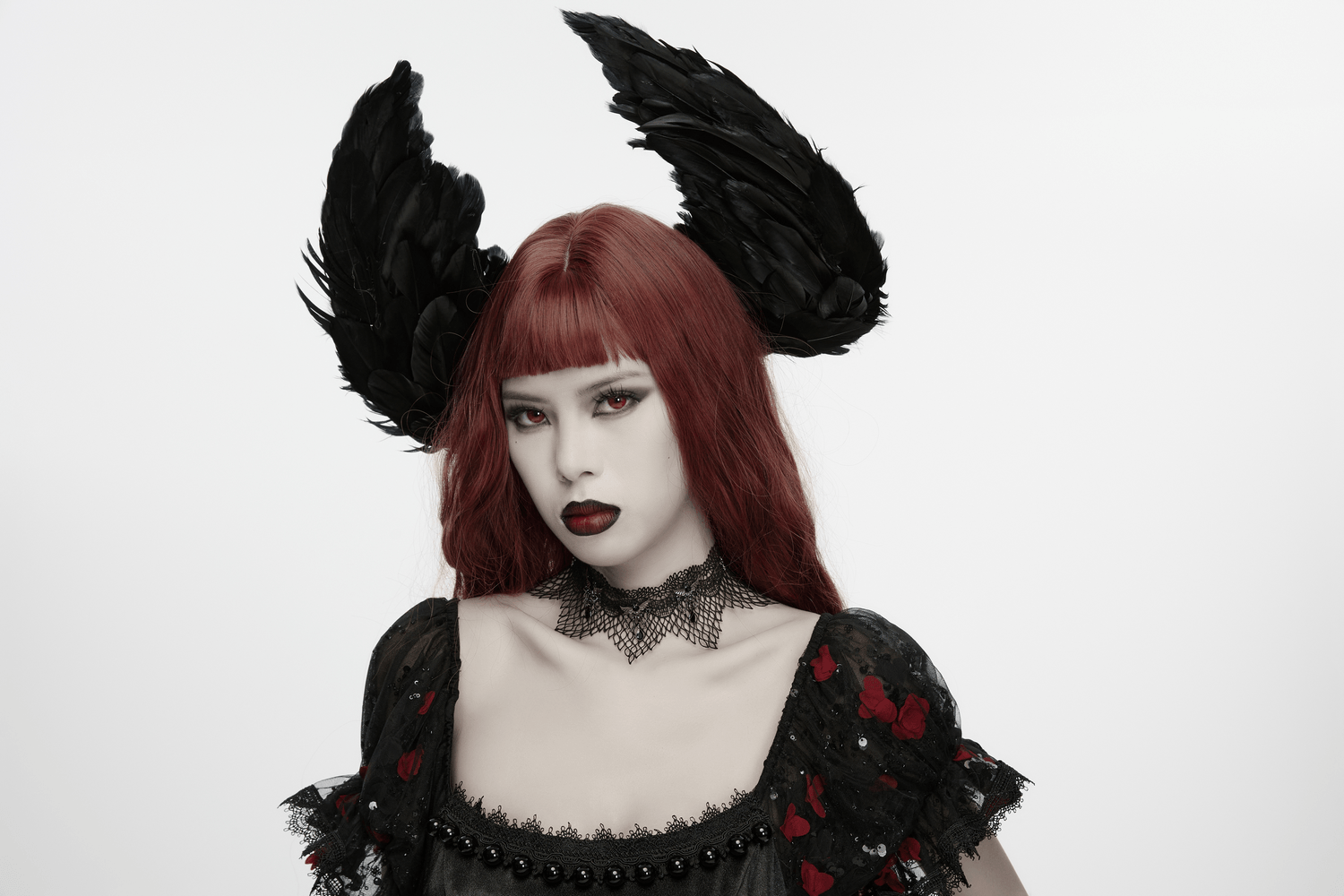 Black Gothic Bat Wing Lace Choker with Crystal Drops adorned on a model with striking red hair and bat-wing accents.