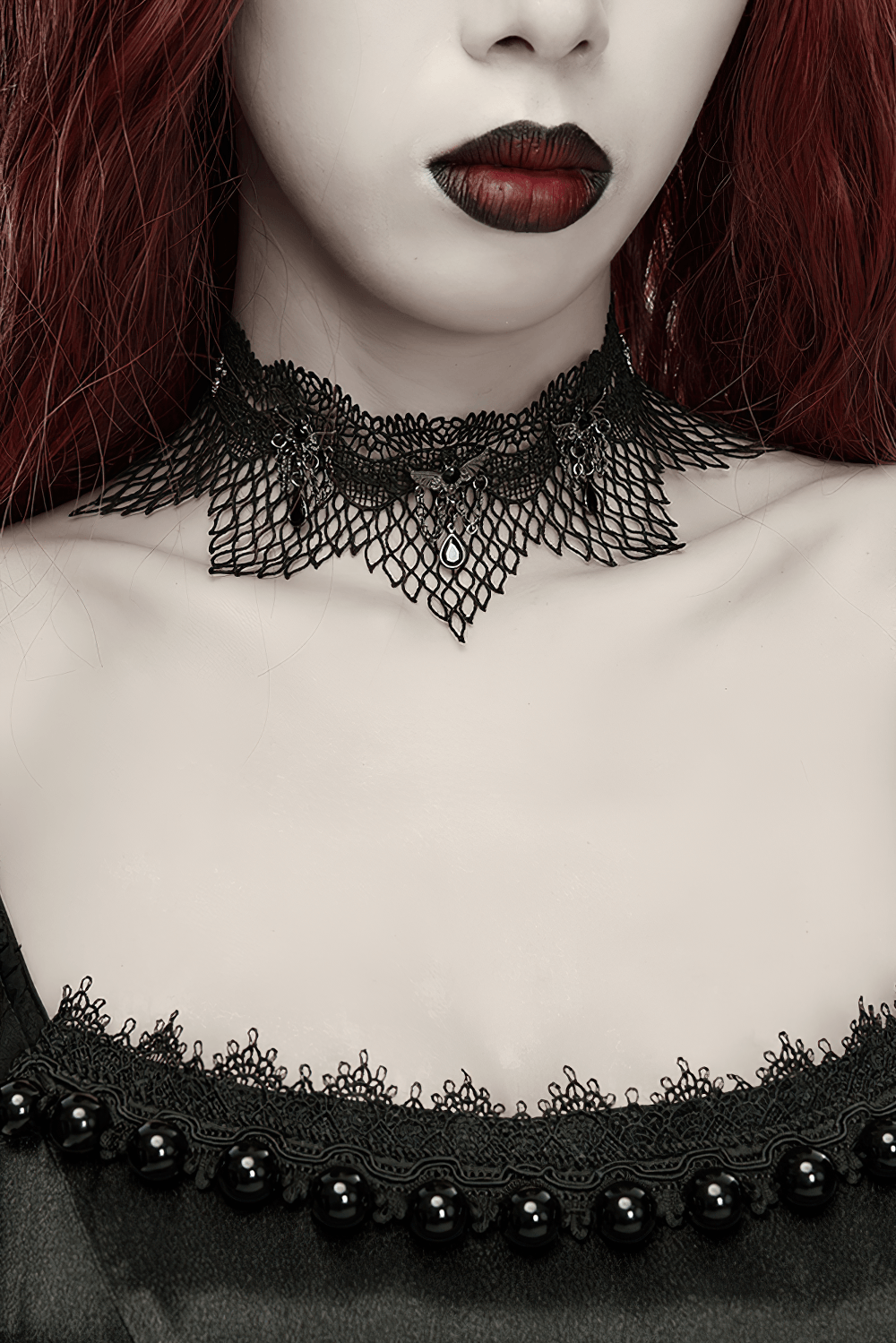 Black Gothic Bat Wing Lace Choker with Crystal Drops showcasing lace accents and dangling charms on a model's neck.