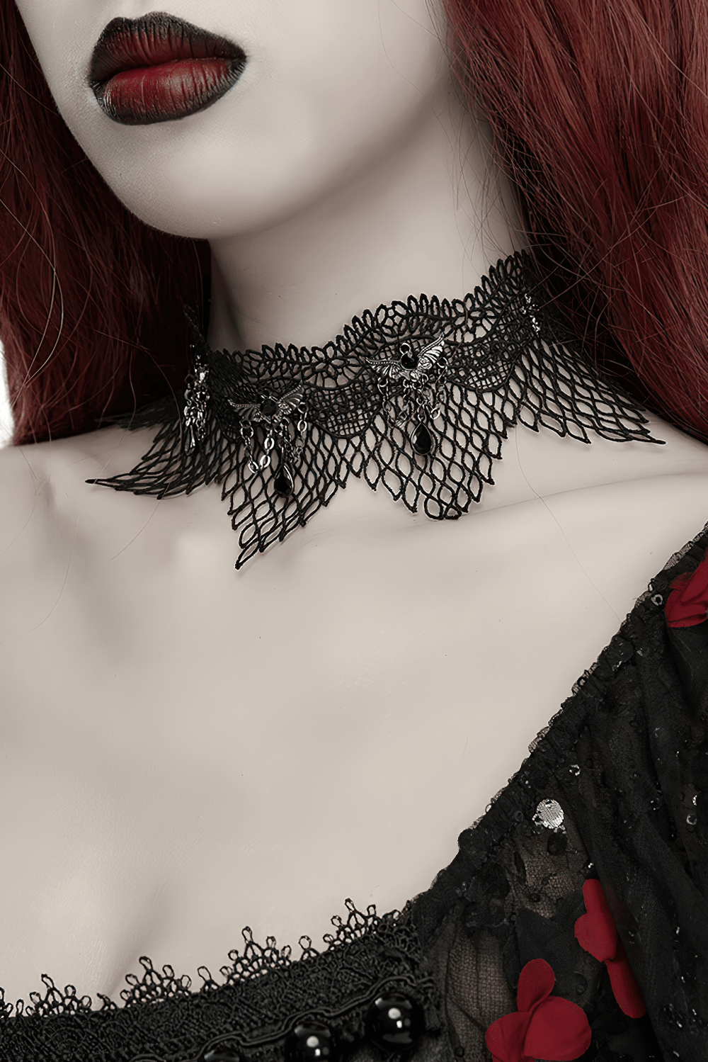 Black Gothic Bat Wing Lace Choker with Crystal Drops showcased on a model, featuring intricate lace and bat-wing charms.