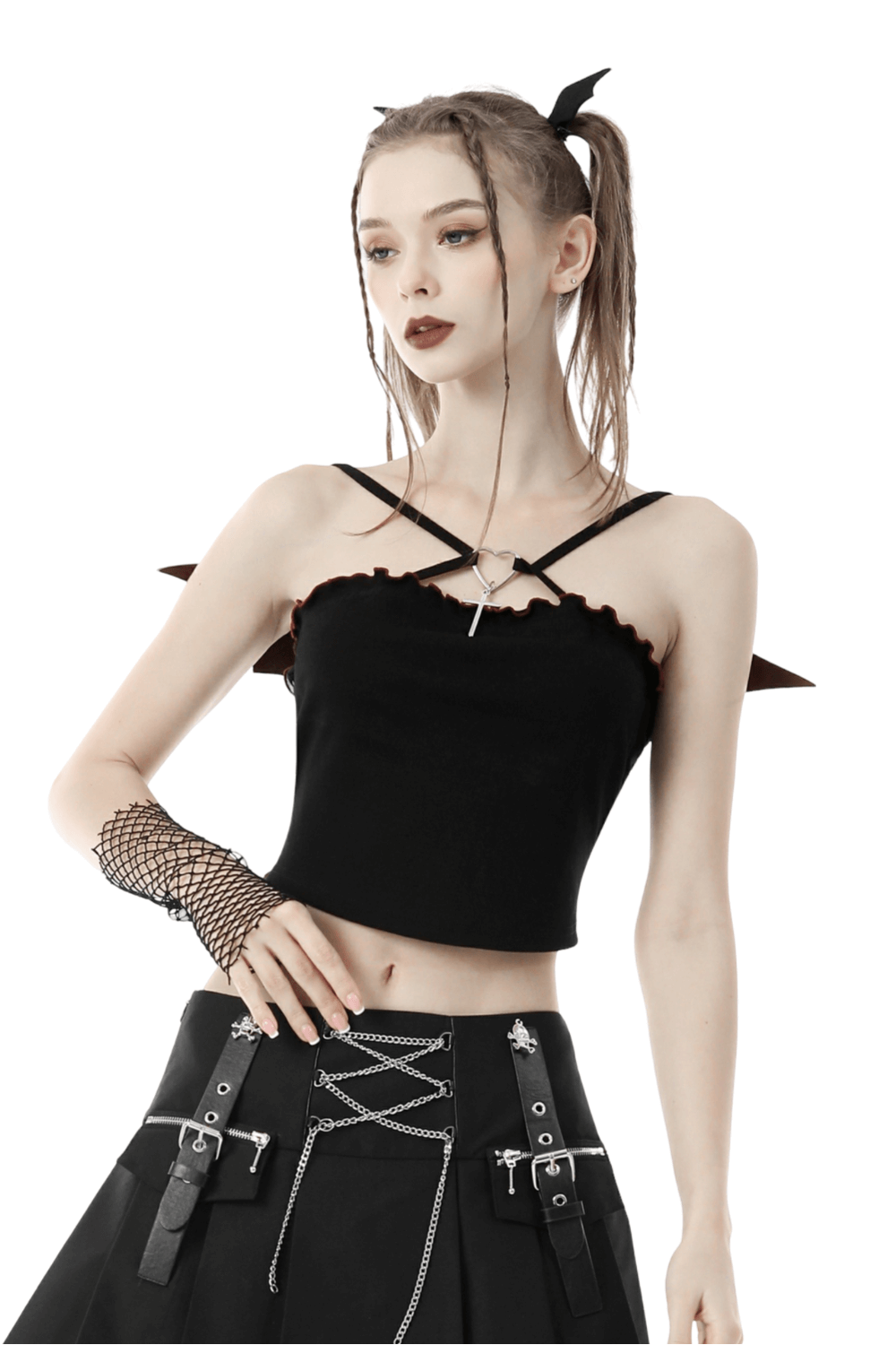 Model wearing a black gothic crop top with edgy design and fishnet accessories, showcasing punk rock style.
