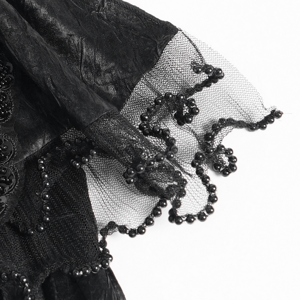 Close-up of the lace cuff with beads from the Black Gothic Brocade Shirt with Ruffles and Lace, showcasing intricate detail.