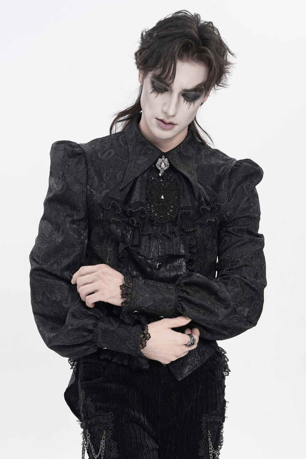 Black Gothic Brocade Shirt with Ruffles and Lace worn by a model with dramatic makeup and styled hair.