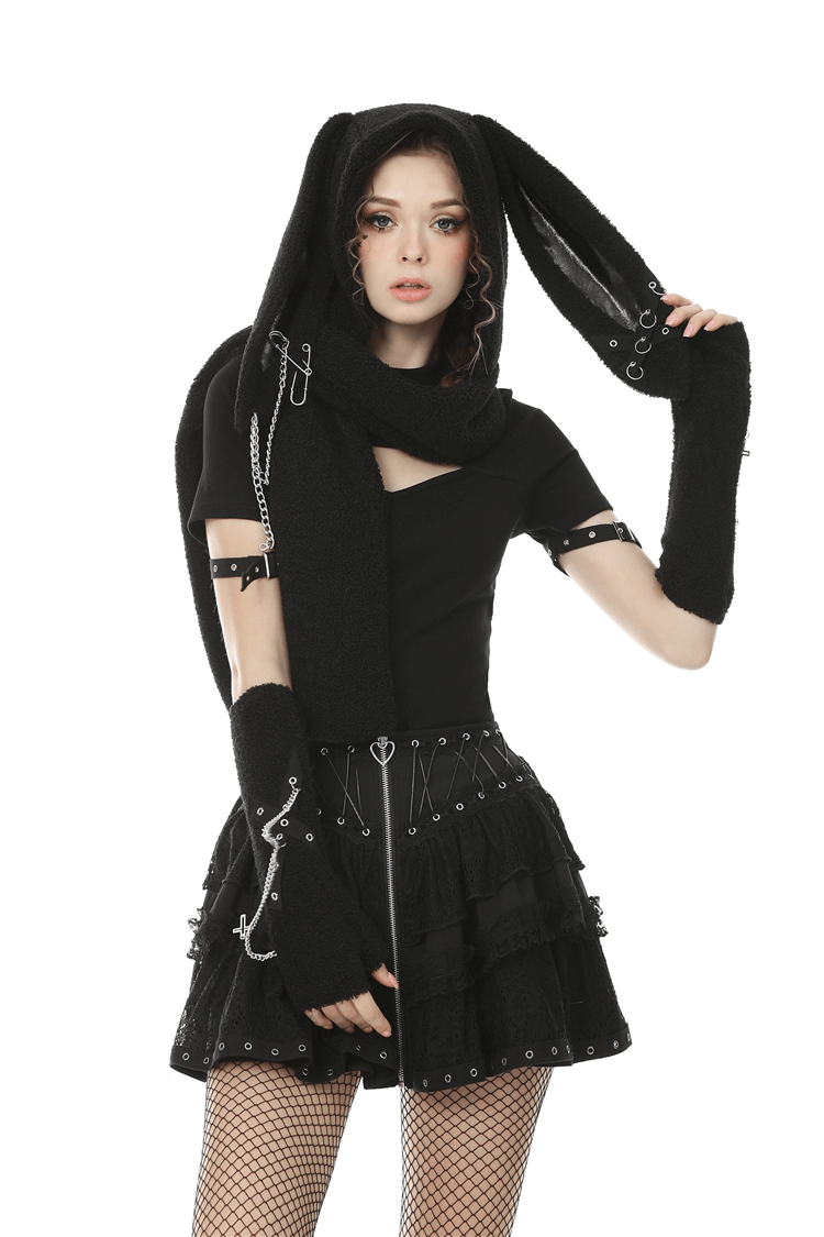 Model wearing a black gothic bunny ear scarf with chains, embodying punk style and winter warmth.