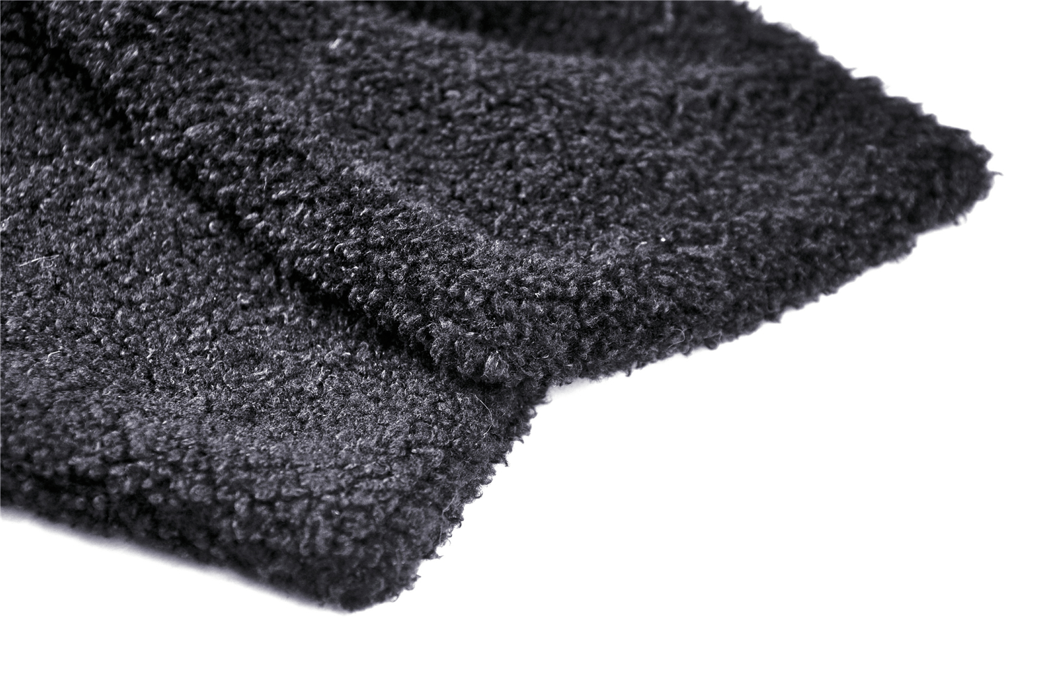 Close-up of soft black fabric for a gothic bunny ear scarf, perfect for adding warmth and style to winter outfits.