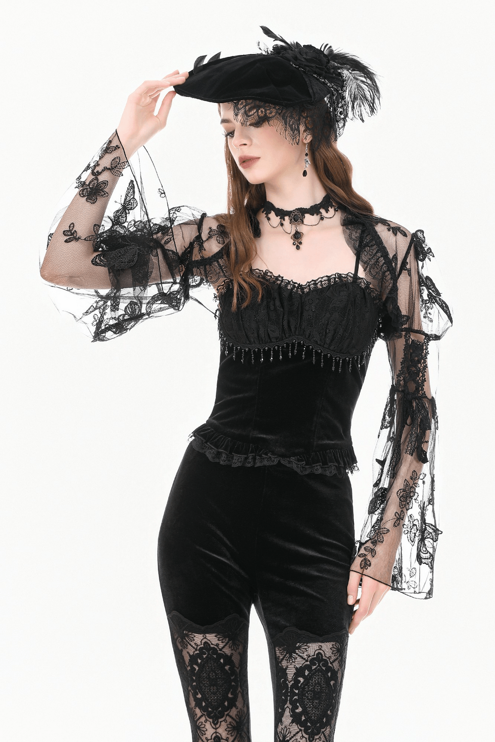 Black Gothic Butterfly Lace Bell Sleeved Bolero styled with elegant accessories and a chic hat.